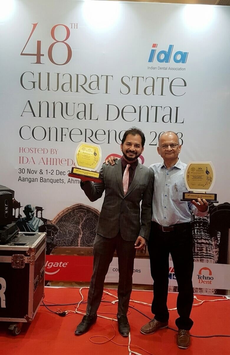 Dr. Kevin Gandhi and Dr. Rajendra T. Gandhi at the Gujarat State Annual Dental Conference